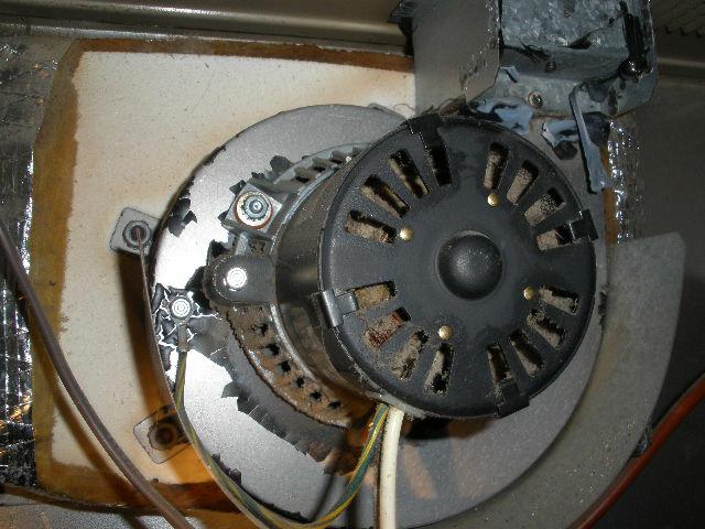 Draft inducer fan clogged with crud and running hot
