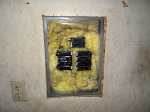 Service panel full of insulation