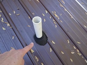 Improper boot flashing on a metal roof