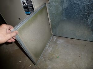 Dirty Furnace Filter - Home Inspection Cedar Rapids, Cedar Falls, Iowa City, Marion, Waterloo, Waverly, Manchester, Independence, Oelwein, Anamosa, Mt Vernon, North Liberty, Coralville, Iowa